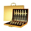 Oro 24 piezas + caja de madera
