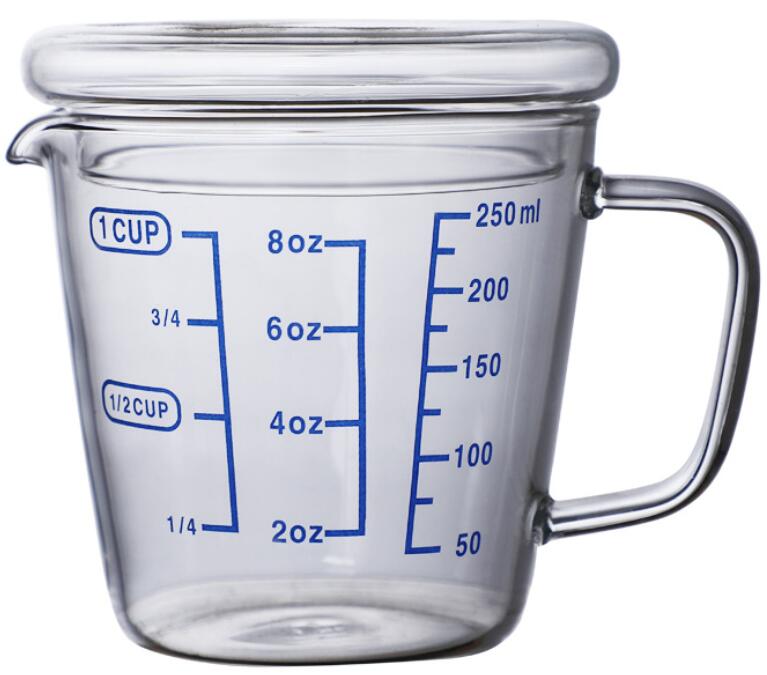
Из высокачественного боросиликатного утолщенное стекло мерный стаканчик со шкалой молока чашки чая кухня мерный стакан мерная ложка 250 мл 