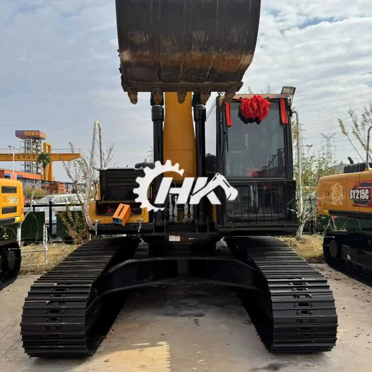 Tracteur chargeur avec pelleteuse