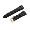 Boucle en or noir-K1