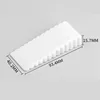 Small white triangular door stop