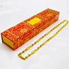 Collana di perle d'oliva con tamburo in vita dorata con scatola
