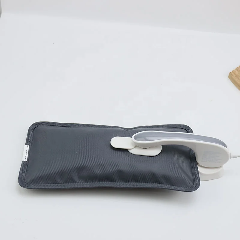 Almohada eléctrica con botella de agua caliente|