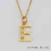 (Gold) letter E (including chain)
