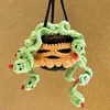 Cabeza de calavera y serpiente