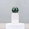 frosted bottle+peacock green marble cover