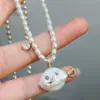 Gold fish necklace (natural pearl+imitation pearl)