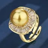Bague ouverte dorée avec billes dorées