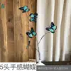 5-head Butterfly WQC with black edges and green body