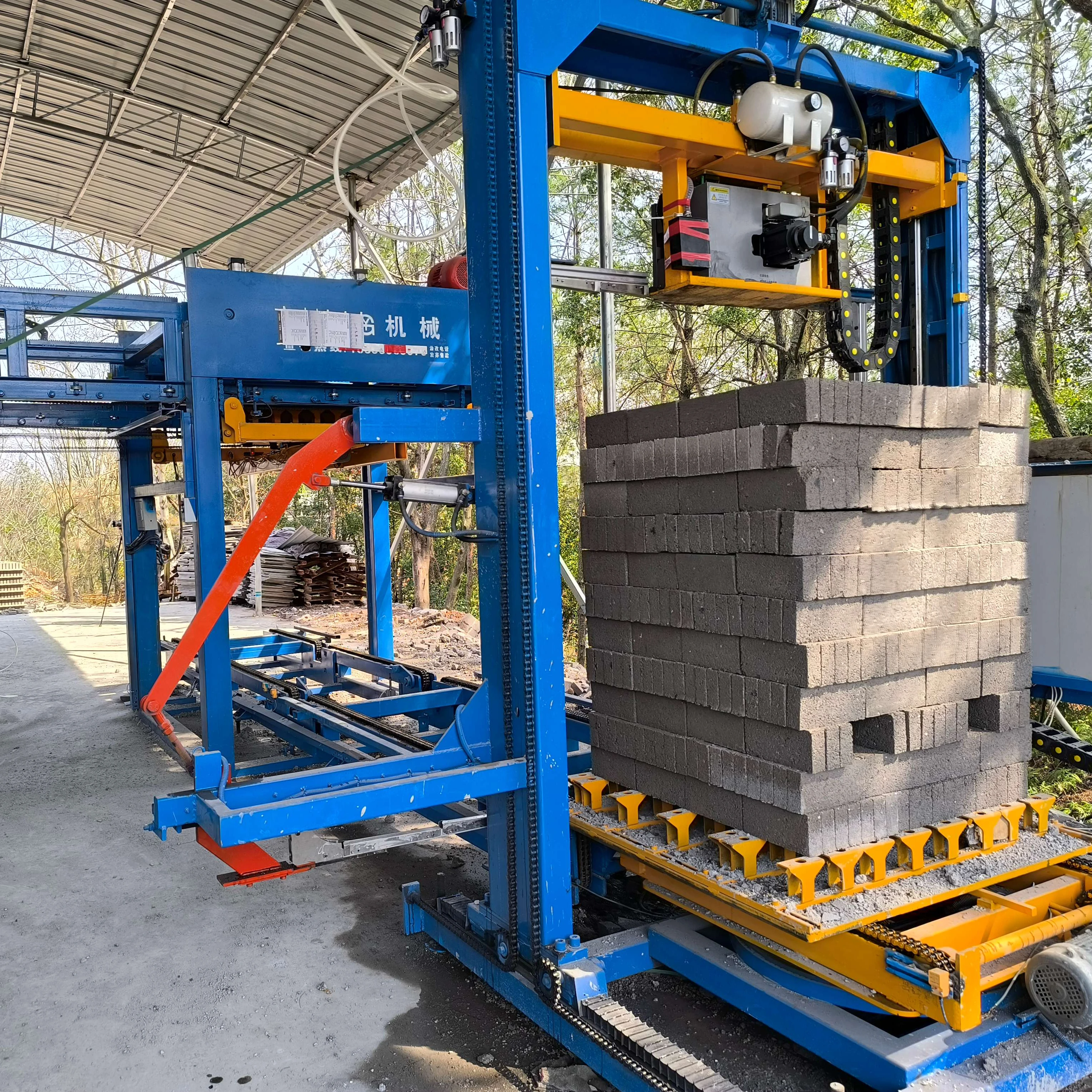 Máy xếp gạch tự động và máy đóng gói - Dây chuyền sản xuất xếp và đóng gói khối bê tông