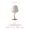 Bicchiere da vino bianco e verde con design a spirale