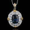 Blue pointed crystal pendant with box chain