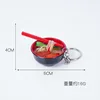 ตะเกียบสีแดงขนาด 4 ซม., บะหมี่ผักสีเขียวแบบสองปีก, พวงกุญแจ
