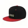 Black hat with red brim