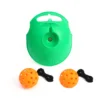 Green base with two orange balls