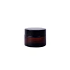 black glass jar with plastic wood grain lid