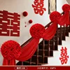 30 large red flowers and 4 six-meter-long ribbons