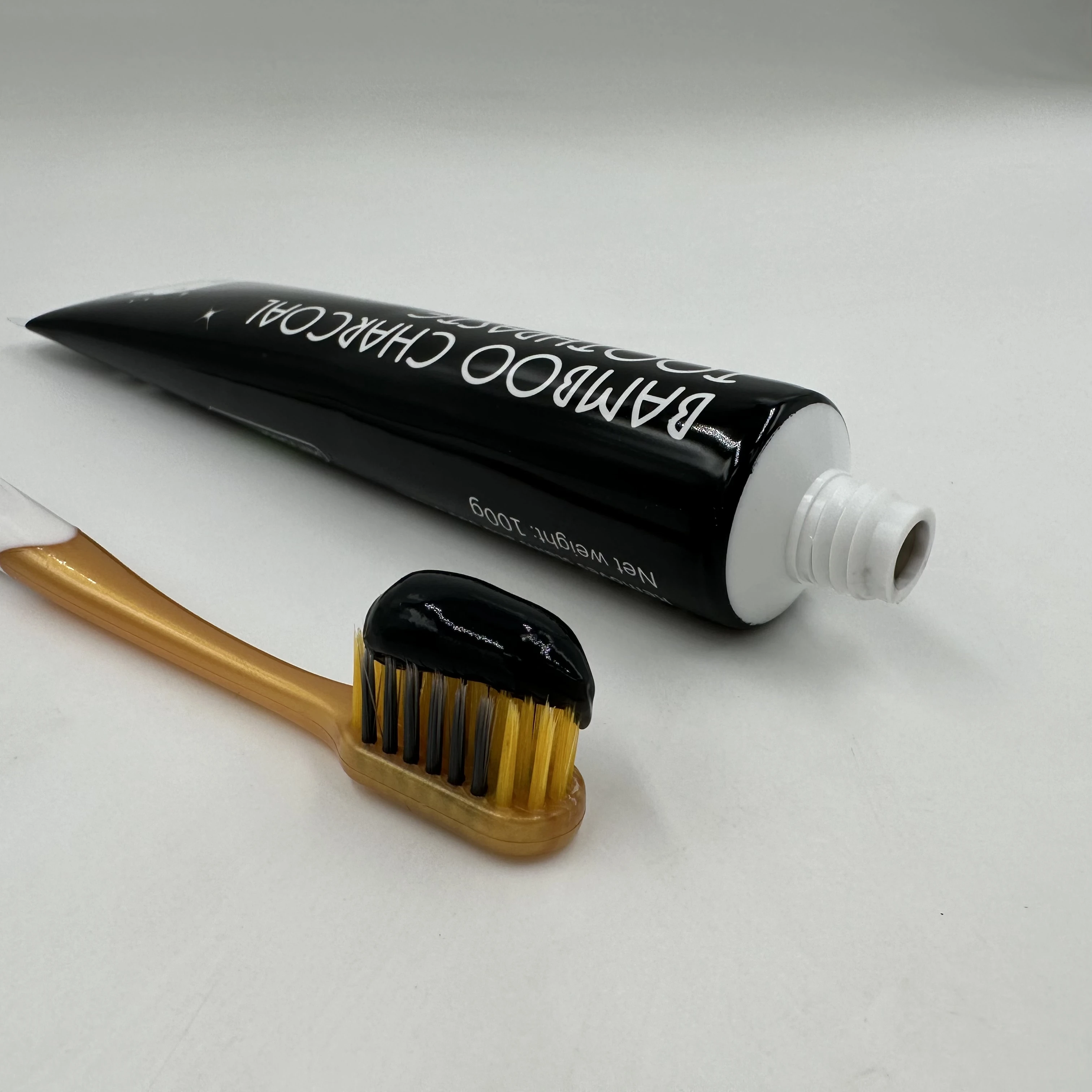 Индивидуальная мини-зубная паста бамбуковый уголь зубная отбеливающий оптовая продажа бамбуковая