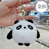 Panda gordito con ojos entrecerrados + hebilla dorada - alto 8 cm