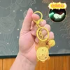 Portachiavi luminoso a forma di piccola tartaruga - cane budino giallo