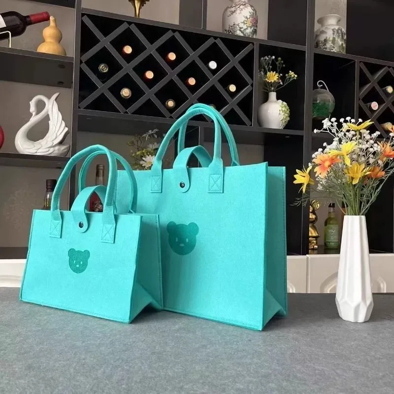 Wholesale multiple colors felt bag with big top quality size custom logo felt handbag for webbing felt gift bag