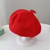 Red [plain wool beret]