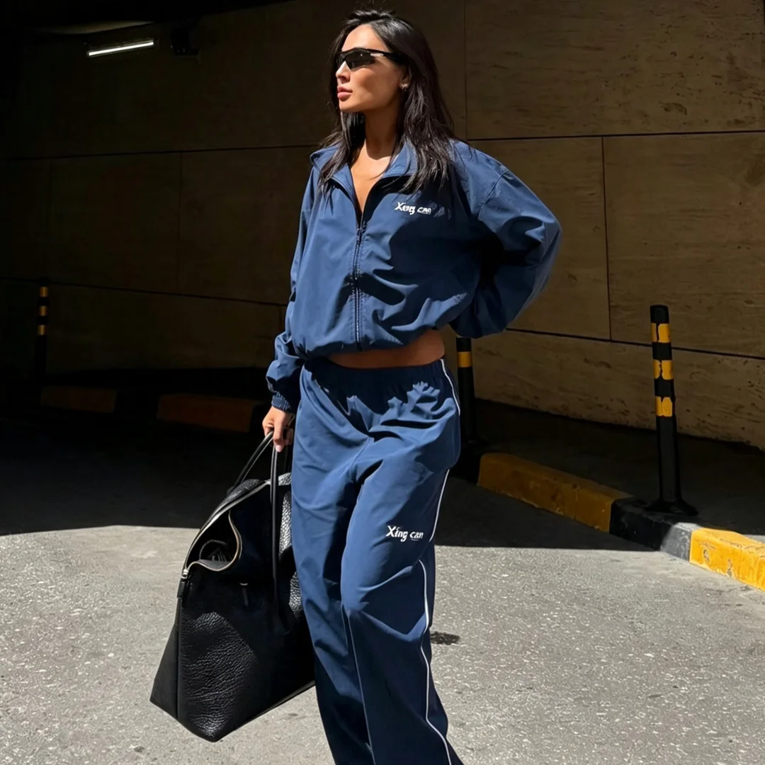 Fabriksproduceret tilpasselig unisex vintage tracksuit med minimal silkskærmsprint, afmærkning, letvægts nylon, casual og vindtæt to-delers sæt, OEM-parti