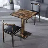 60*60 una mesa y dos sillas cartas