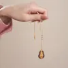 Produzione di gioielli in legno naturale intarsiato in oro reale 24K