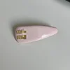 Clip a molla rosa