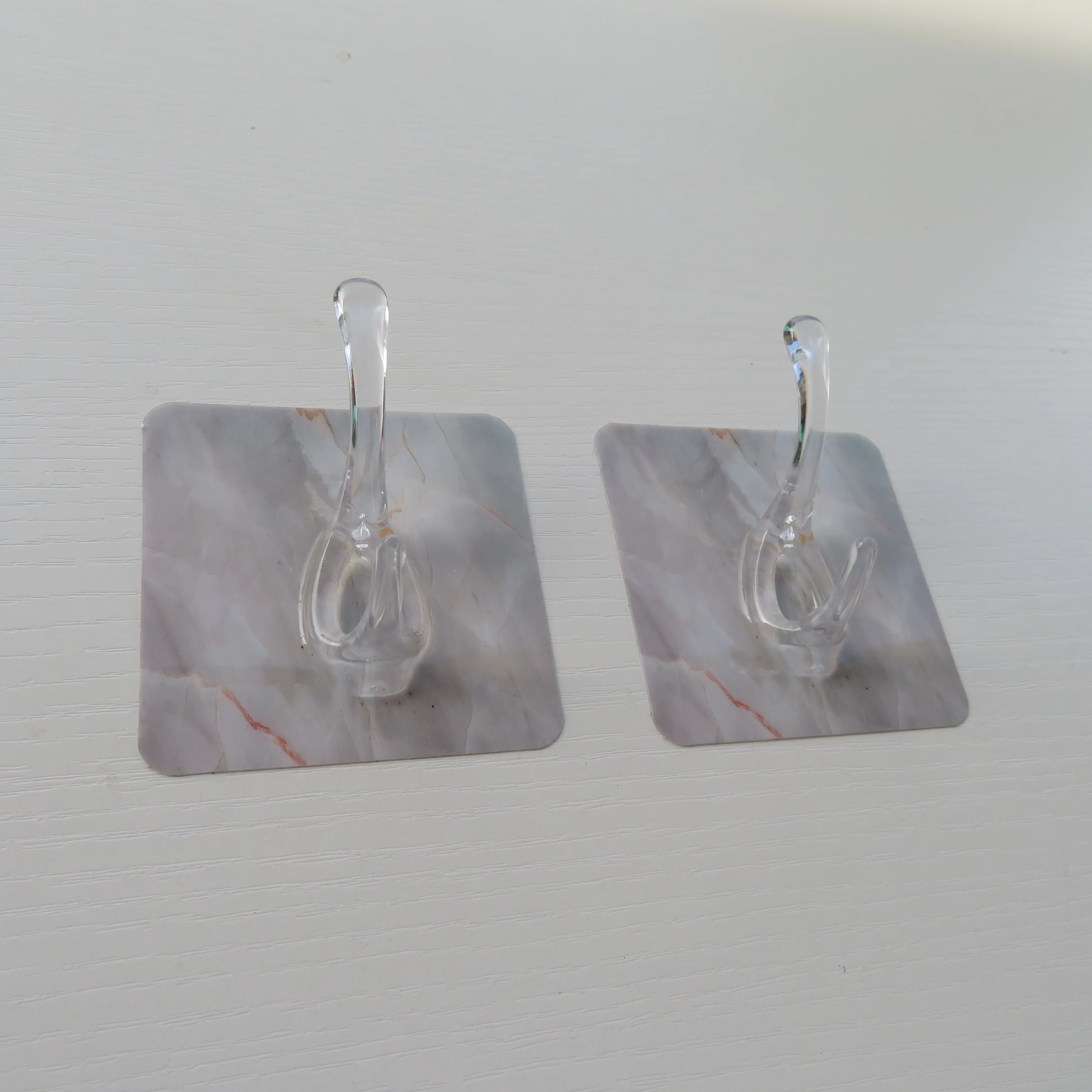 Marble novelty hookss can be customized Traceless novelty hooks Hollow coat and hat bathroom door back transparent novelty hooks factory