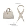 Beige diamond-shaped crossbody strap