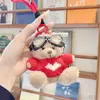 Khaki bear red sweater lanyard glasses