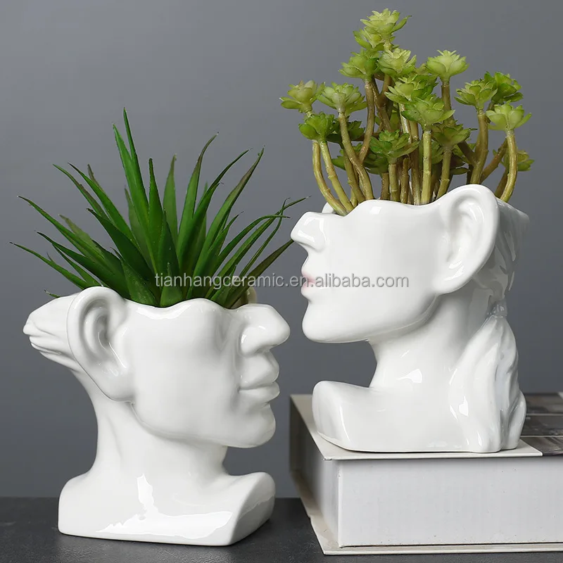 Modern Creative head ceramic black white face home decoration flower arrangement vase.jpg