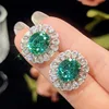 Bird's Nest cut Parra green ear studs