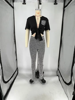 HugeDomains.com  Stripped pants outfit, Black and white striped