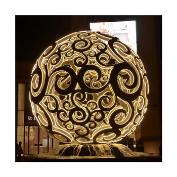 Large hollow stainless steel ball sculpture for modern outdoor commercial space