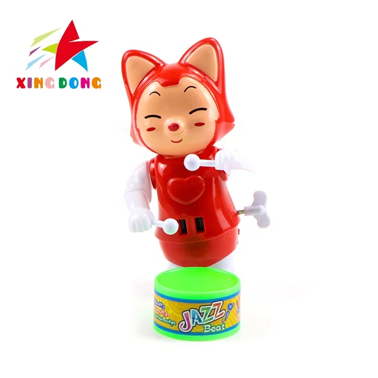 Wholesale custom wind up toys cute mini cartoon boy beat a drum