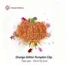 Clip citrouille à paillettes orange