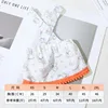 X-shaped overalls - light orange