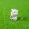 colorful Small bear eating ice cream
