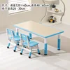 A table and two chairs in light blue wood grain.