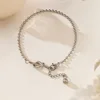 xkb2237 bracelet de perles rondes nouées en acier