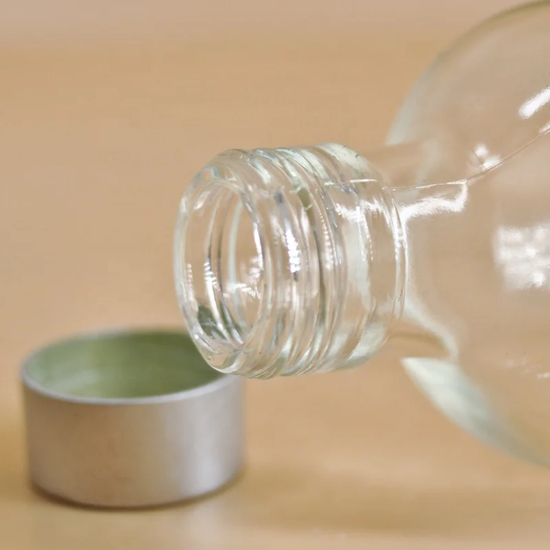 fancy 150ml glass bottles with metal lid for packaging in the stock