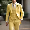 Light yellow suit vest and dress pants