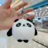 Panda gordito con ojos entrecerrados + hebilla plateada - alto 8 cm