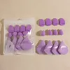Conjunto morado de 12 piezas.