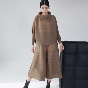 2025 New Women's Miyake Pleated Two Piece Outfit Asymmetric High Neck Top with Wide Leg Pants Elegant Casual Set Factory Direct