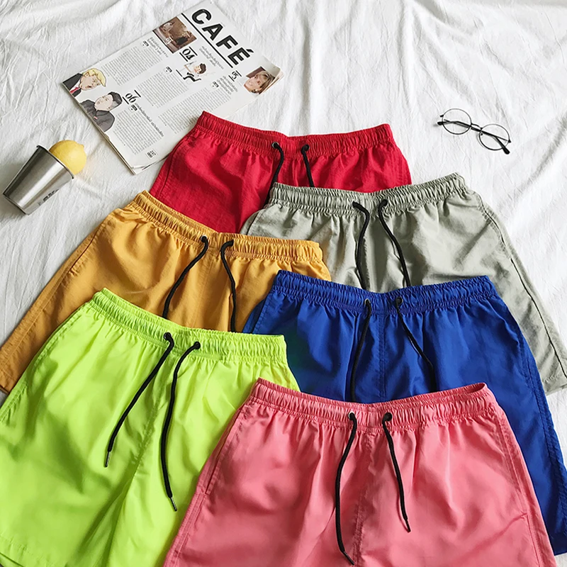 Pantaloncini da surf all'ingrosso Pantaloncini casual da spiaggia da uomo personalizzati Capispalla di moda Costume da surf allentato impermeabile484_voghion.com