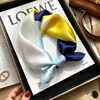 53 seta colorblock blu scala e giallo